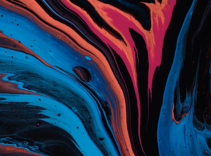 Abstract fluid artwork in blue, orange and pink